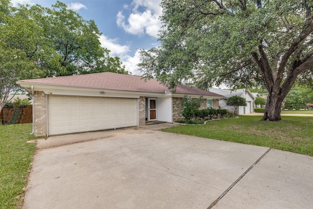 2505 Blue Quail Dr, Arlington, TX 76017 - ranch-style house featuring a garage, concrete driveway, a front lawn, and brick siding