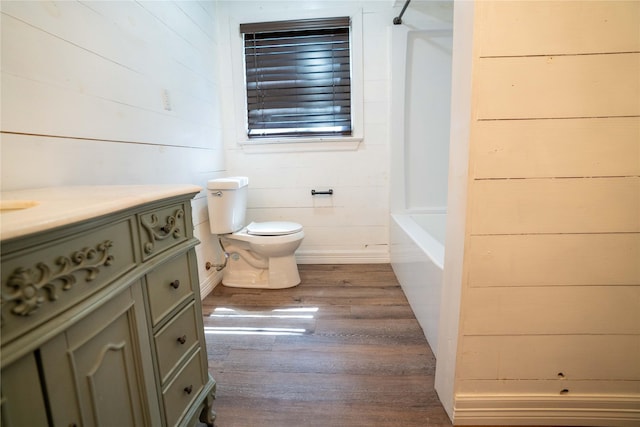 2206 Culbertson, Paris, TX 75460 - bathroom with wood finished floors, vanity, toilet, and baseboards