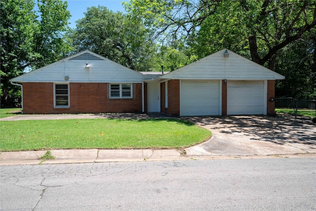 2206 Culbertson, Paris, TX 75460 - single story home with an attached garage, brick siding, and driveway