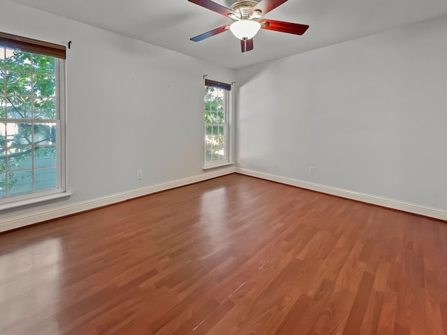 2727 Shelby Ave Unit X, Dallas, TX 75219 - unfurnished room with wood finished floors, plenty of natural light, a ceiling fan, and baseboards