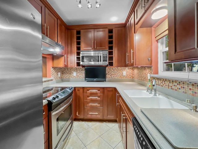 2727 Shelby Ave Unit X, Dallas, TX 75219 - kitchen featuring appliances with stainless steel finishes, under cabinet range hood, light tile patterned floors, tasteful backsplash, and open shelves