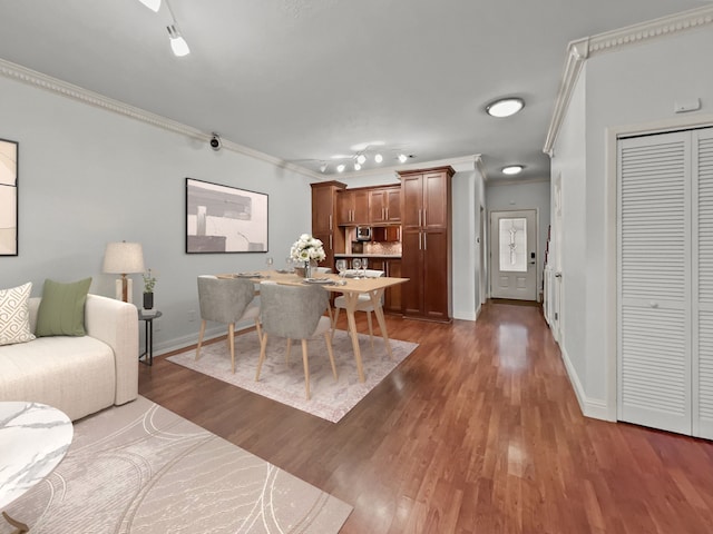 2727 Shelby Ave Unit X, Dallas, TX 75219 - living area with ornamental molding, dark wood finished floors, and baseboards