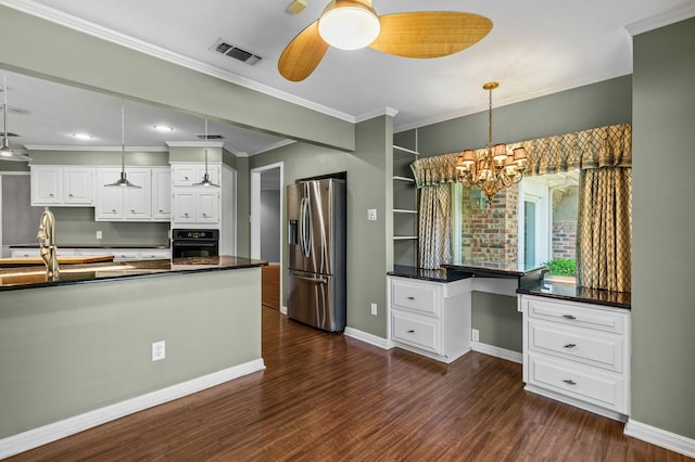 3410 Timbermill Rd, Waco, TX 76710 - kitchen featuring stainless steel fridge, oven, dark wood-style floors, white cabinetry, and dark countertops