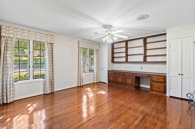 3410 Timbermill Rd, Waco, TX 76710 - unfurnished office featuring built in study area, ceiling fan, ornamental molding, wood finished floors, and baseboards
