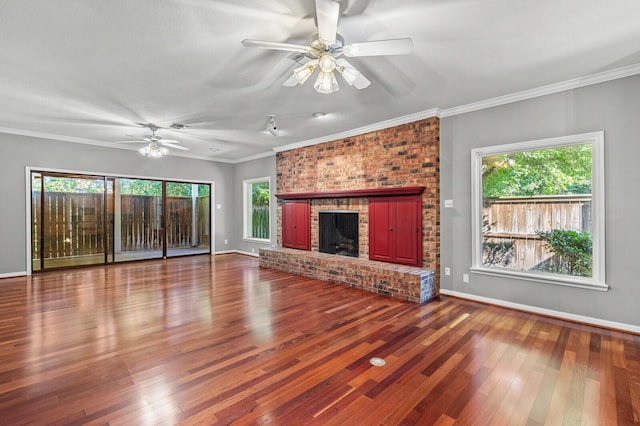 3410 Timbermill Rd, Waco, TX 76710 - unfurnished living room with ceiling fan, hardwood / wood-style floors, baseboards, and ornamental molding
