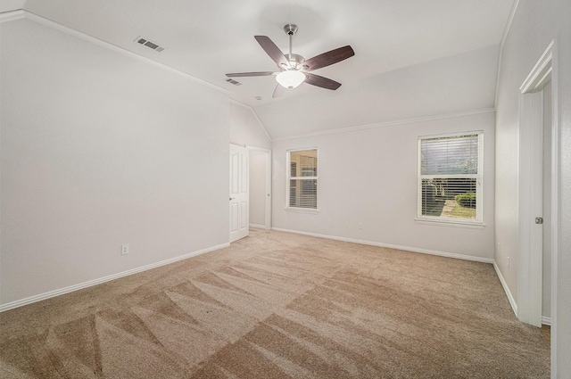 2005 Timber Cove Ct, Weatherford, TX 76087 - empty room with lofted ceiling, light carpet, a ceiling fan, baseboards, and ornamental molding