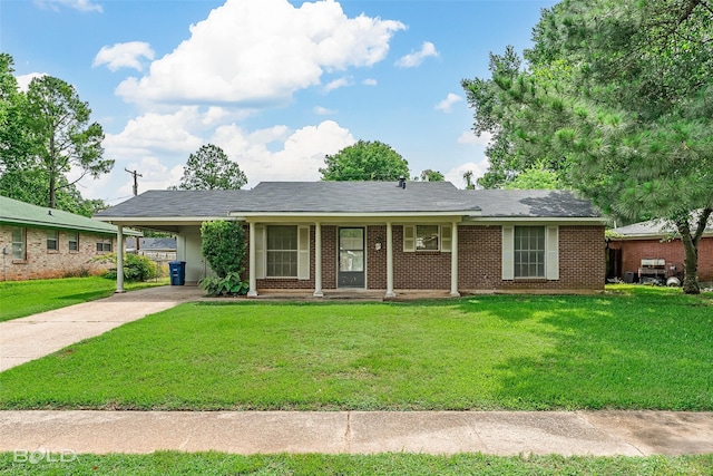 2541 Mecom Dr, Shreveport, LA 71104 - ranch-style home with driveway, a front lawn, a carport, covered porch, and brick siding