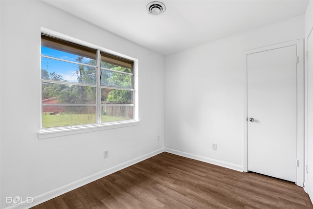 2541 Mecom Dr, Shreveport, LA 71104 - spare room with wood finished floors and baseboards
