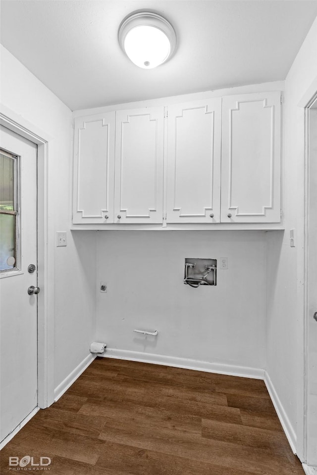 2541 Mecom Dr, Shreveport, LA 71104 - washroom featuring cabinet space, baseboards, washer hookup, dark wood-style floors, and electric dryer hookup