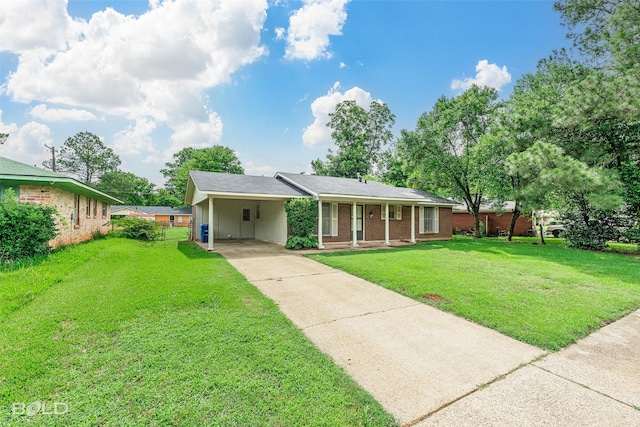 2541 Mecom Dr, Shreveport, LA 71104 - single story home with driveway, a carport, a front yard, and brick siding