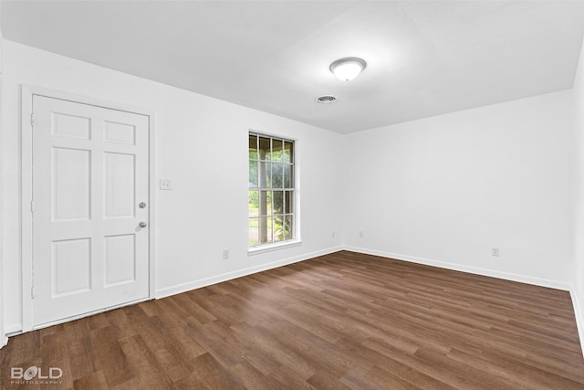 2541 Mecom Dr, Shreveport, LA 71104 - unfurnished room featuring dark wood-style floors and baseboards