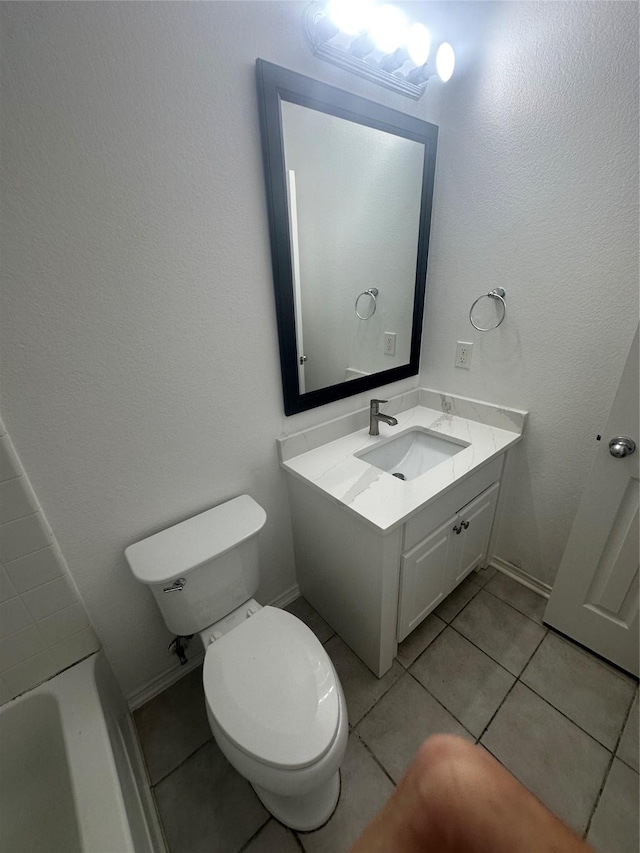 424 Shady Shore Ln, Crowley, TX 76036 - full bath featuring vanity, toilet, a tub to relax in, and tile patterned flooring