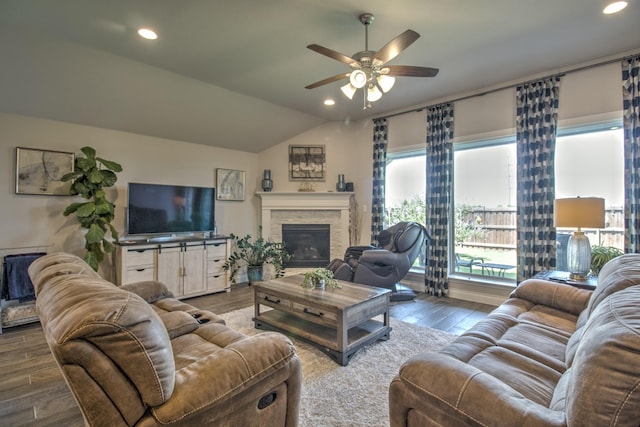 3609 Honey Suckle Ln, Little Elm, TX 75068 - living room featuring ceiling fan, plenty of natural light, wood finished floors, a stone fireplace, and recessed lighting