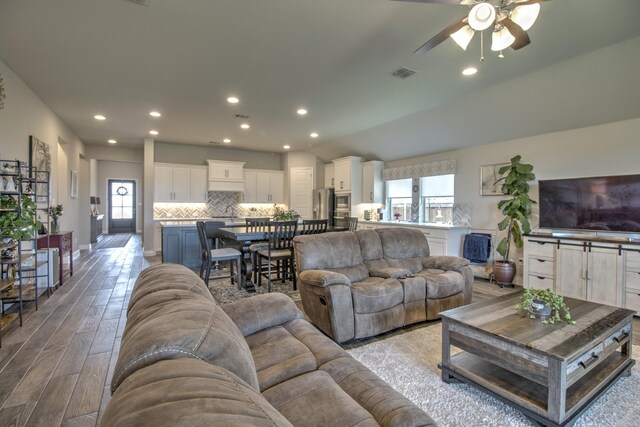 3609 Honey Suckle Ln, Little Elm, TX 75068 - living area featuring ceiling fan, light wood finished floors, and recessed lighting