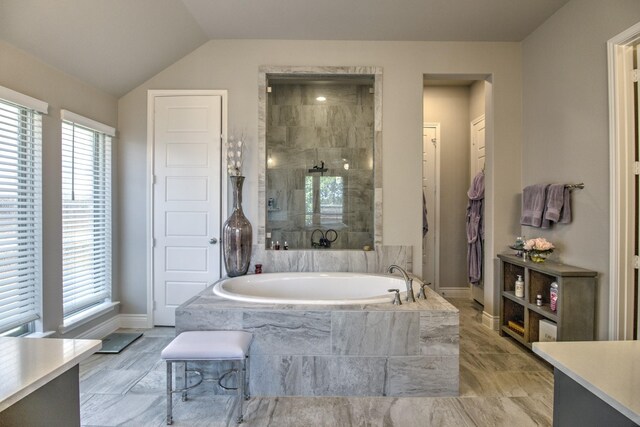 3609 Honey Suckle Ln, Little Elm, TX 75068 - bathroom featuring a bath, baseboards, vanity, and a tile shower