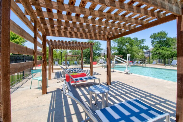 3609 Honey Suckle Ln, Little Elm, TX 75068 - view of patio / terrace featuring a pergola and a community pool