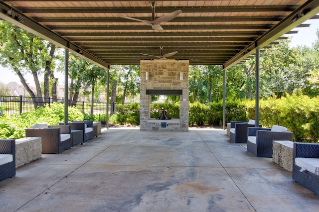 3609 Honey Suckle Ln, Little Elm, TX 75068 - view of patio with ceiling fan and an outdoor living space with a fireplace