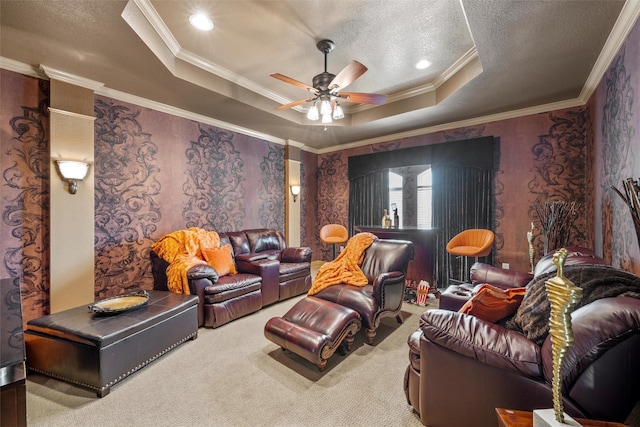 1300 Enchanted Rock Cir, Waco, TX 76712 - living area featuring a tray ceiling, crown molding, ceiling fan, carpet floors, and a textured ceiling