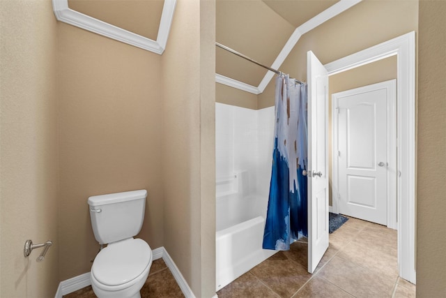 1300 Enchanted Rock Cir, Waco, TX 76712 - bathroom featuring toilet, shower / tub combo with curtain, tile patterned floors, vaulted ceiling, and crown molding