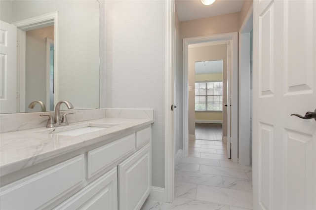 3700 Wagon Wheel Ct, Richardson, TX 75082 - bathroom featuring vanity and marble finish flooring