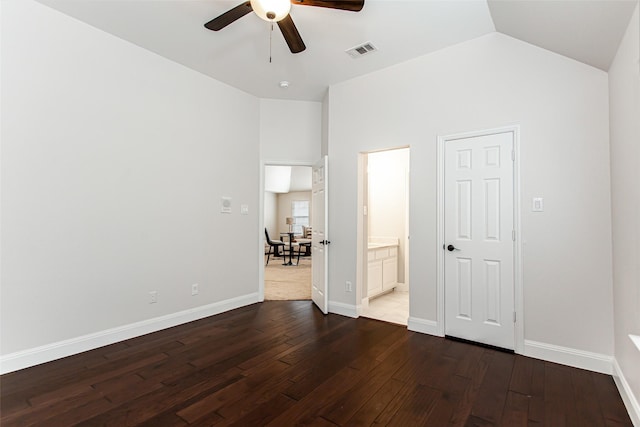 3700 Wagon Wheel Ct, Richardson, TX 75082 - unfurnished bedroom with dark wood-type flooring, vaulted ceiling, connected bathroom, and a ceiling fan