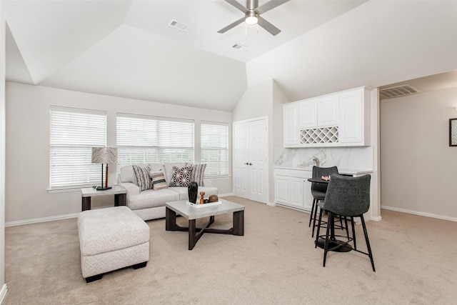 3700 Wagon Wheel Ct, Richardson, TX 75082 - living area with ceiling fan, vaulted ceiling, and light carpet