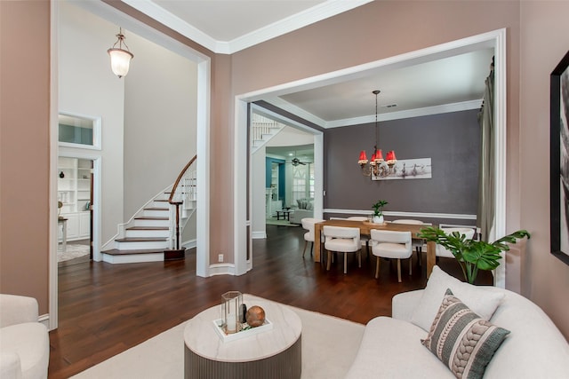 3700 Wagon Wheel Ct, Richardson, TX 75082 - living room with wood finished floors, crown molding, stairway, a chandelier, and ceiling fan