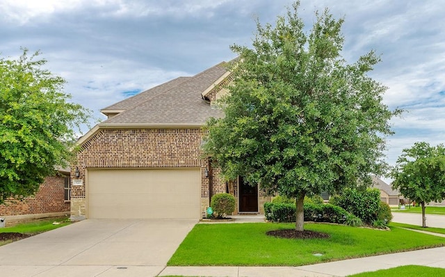 4323 Cherry Ln, Melissa, TX 75454 - view of front of property featuring brick siding, a front yard, roof with shingles, concrete driveway, and a garage
