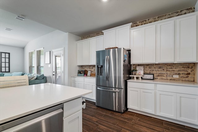 2709 Madera Canyon Rd, Aubrey, TX 76227 - kitchen featuring stainless steel refrigerator with ice dispenser, dark wood-style floors, light countertops, and wine cooler