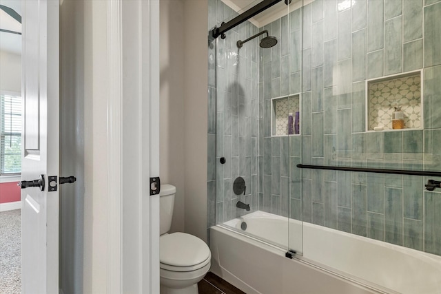 2709 Madera Canyon Rd, Aubrey, TX 76227 - full bathroom with toilet, combined bath / shower with glass door, and baseboards