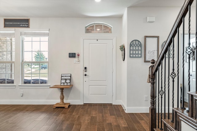 2709 Madera Canyon Rd, Aubrey, TX 76227 - entryway featuring stairway, dark wood-style flooring, and baseboards