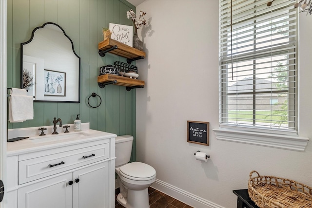 2709 Madera Canyon Rd, Aubrey, TX 76227 - bathroom featuring wood finished floors, vanity, toilet, and baseboards