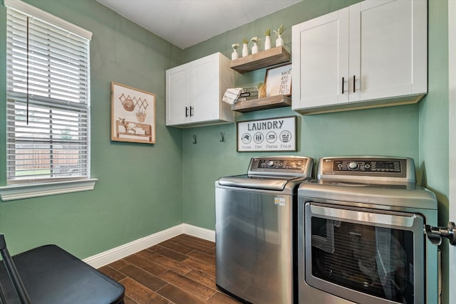 2709 Madera Canyon Rd, Aubrey, TX 76227 - laundry room with cabinet space, washing machine and clothes dryer, baseboards, and dark wood-style floors
