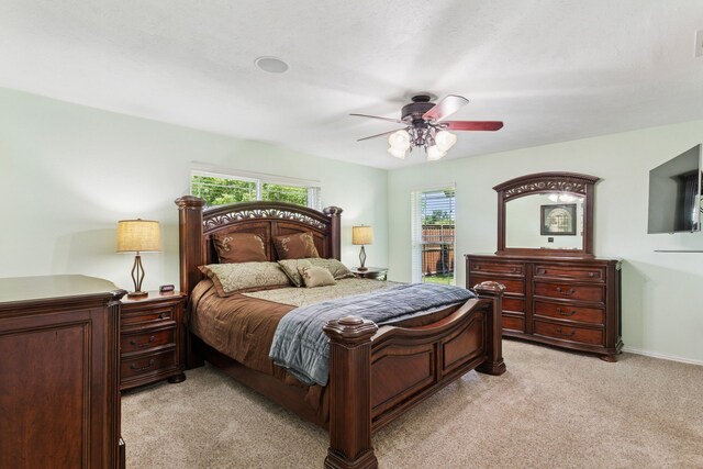 3100 Jomar Dr, Plano, TX 75075 - bedroom with light colored carpet and ceiling fan