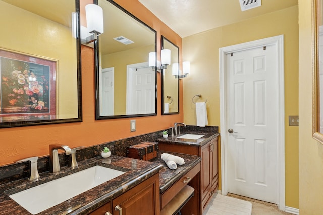3100 Jomar Dr, Plano, TX 75075 - full bathroom with double vanity and tile patterned flooring