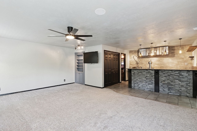 3100 Jomar Dr, Plano, TX 75075 - unfurnished living room featuring carpet, ceiling fan, and baseboards