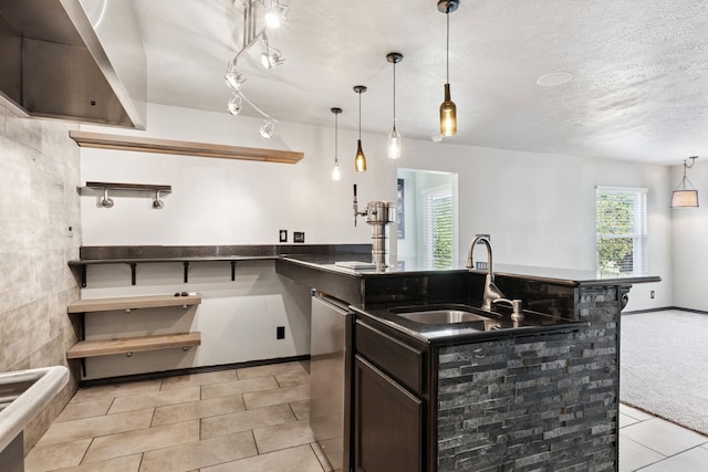 3100 Jomar Dr, Plano, TX 75075 - kitchen featuring a sink, open shelves, light tile patterned floors, dark brown cabinets, and pendant lighting