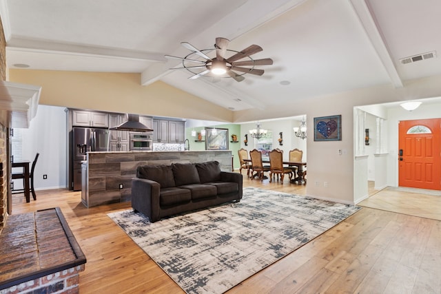 3100 Jomar Dr, Plano, TX 75075 - living area with a ceiling fan, light wood-style floors, a chandelier, and baseboards