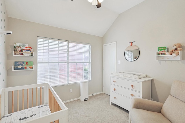 1689 Big Bend Dr, Lewisville, TX 75077 - bedroom with a nursery area, lofted ceiling, light carpet, baseboards, and ceiling fan