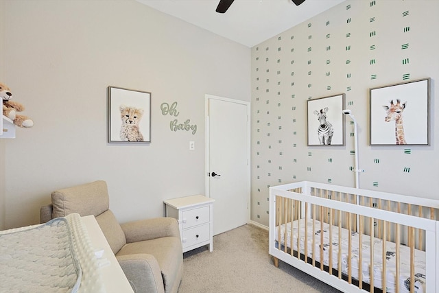 1689 Big Bend Dr, Lewisville, TX 75077 - bedroom with a crib, light carpet, and ceiling fan