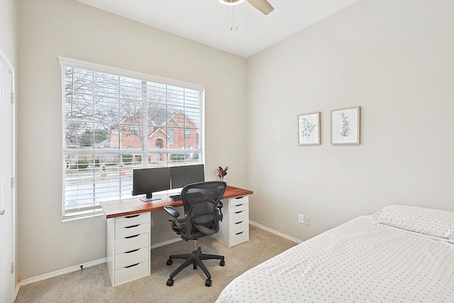 1689 Big Bend Dr, Lewisville, TX 75077 - bedroom with light carpet, an office area, baseboards, and ceiling fan