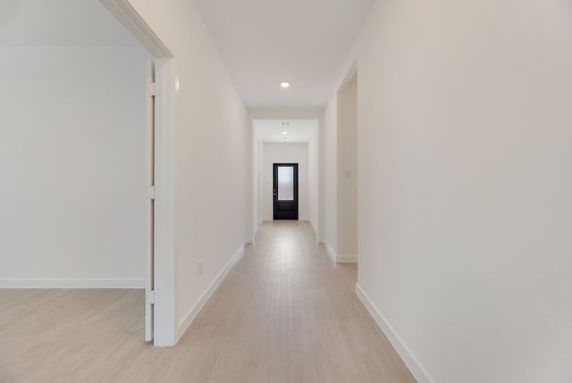 1301 Francesca Dr, Little Elm, TX 75068 - hallway featuring light wood finished floors, baseboards, and recessed lighting