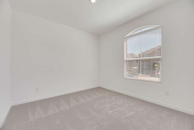 1301 Francesca Dr, Little Elm, TX 75068 - empty room with light colored carpet, baseboards, and lofted ceiling