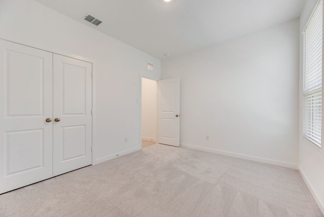 1301 Francesca Dr, Little Elm, TX 75068 - unfurnished bedroom with carpet floors, baseboards, and a closet