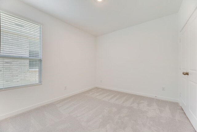 1301 Francesca Dr, Little Elm, TX 75068 - spare room with light colored carpet and baseboards