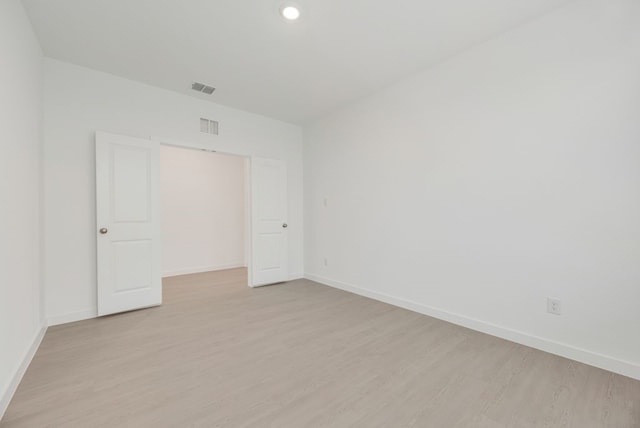 1301 Francesca Dr, Little Elm, TX 75068 - unfurnished room with light wood-style flooring, baseboards, and recessed lighting