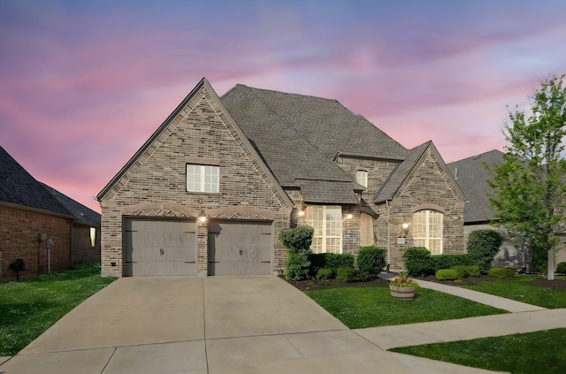 6313 Savannah Oak Trl, Flower Mound, TX 76226 - french country style house featuring brick siding, driveway, and a lawn