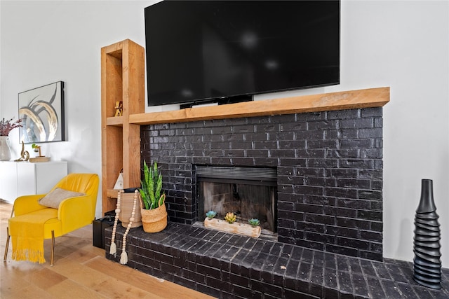 3412 Regal, Mesquite, TX 75149 - detailed view of wood finished floors and a brick fireplace