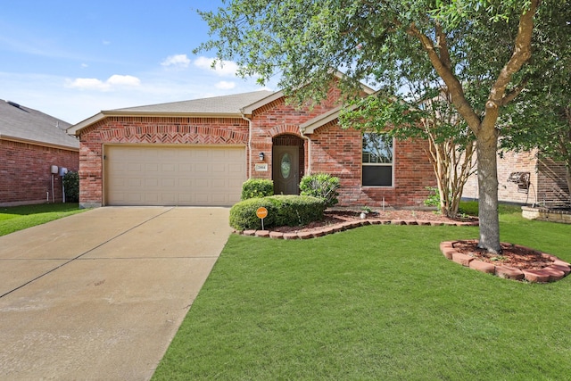 2004 Uvalde Dr, Forney, TX 75126 - view of front of home with brick siding, concrete driveway, a garage, and a front lawn
