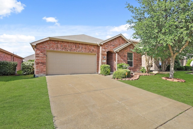 2004 Uvalde Dr, Forney, TX 75126 - view of front of house featuring brick siding, a garage, a front yard, and concrete driveway